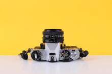 Load image into Gallery viewer, Fujica AX-1 35mm SLR Film Camera with X-Fujinon 55mm F/2.2 Lens