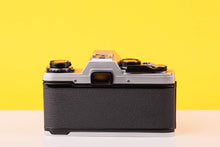 Load image into Gallery viewer, Olympus OM10 35mm SLR Film Camera with Olympus OM-System S Zuiko Auto-Zoom 28-48mm f4 Lens