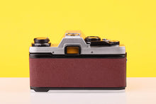 Load image into Gallery viewer, Olympus OM10 35mm SLR Film Camera with Miranda 28-70mm f3.5-4.5 MC Macro Lens Burgundy