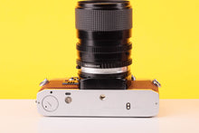 Load image into Gallery viewer, Olympus OM10 35mm SLR Film Camera with Miranda 28-70mm f3.5-4.5 MC Macro Lens Burgundy