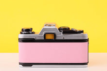 Load image into Gallery viewer, Olympus OM10 35mm SLR Film Camera and Olympus Zuiko Auto-T 135mm f3.5 Lens