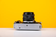 Load image into Gallery viewer, Canon AE-1 Program 35mm Film Camera with Canon FD 50mm f/1.8 Lens