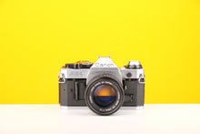 Load image into Gallery viewer, Canon AE-1 Program 35mm SLR Film Camera with Canon 50mm f1.4 FD Lens