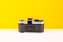 Load image into Gallery viewer, Canon AE-1 35mm SLR Film Camera with Canon FD 50mm f/2 Lens