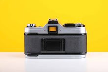 Load image into Gallery viewer, Canon AE-1 35mm SLR Film Camera with Canon Zoom FD 35-70mm f3.5-4.5 Lens