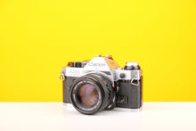 Load image into Gallery viewer, Canon AE-1 Program 35mm SLR Film Camera with Canon 50mm f1.4 FD Lens