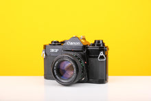 Load image into Gallery viewer, Canon EF 35mm SLR Film Camera with Canon FD 50mm f1.4 Lens