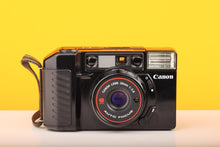 Load image into Gallery viewer, Canon Sure Shot 35mm Point and Shoot Film Camera