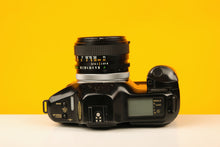 Load image into Gallery viewer, Canon T90 35mm Film Camera with Canon 50mm f/1.4 Lens