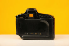 Load image into Gallery viewer, Canon T90 35mm Film Camera with Canon 50mm f/1.4 Lens