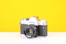 Load image into Gallery viewer, Consina 4000s 35mm SLR Film Camera with Cosinon Auto 55mm f2.8 Lens