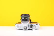 Load image into Gallery viewer, Consina 4000s 35mm SLR Film Camera with Cosinon Auto 55mm f2.8 Lens