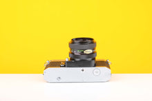 Load image into Gallery viewer, Consina 4000s 35mm SLR Film Camera with Cosinon Auto 55mm f2.8 Lens