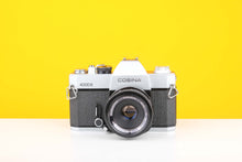 Load image into Gallery viewer, Consina 4000s 35mm SLR Film Camera with Cosinon Auto 55mm f2.8 Lens