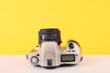 Load image into Gallery viewer, Nikon F60 35mm SLR Film Camera with Sigma 24mm f/2.8 Lens