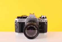 Load image into Gallery viewer, Canon AE-1 Program 35mm Film Camera with Canon FD 35-70mm f/3.5 Lens