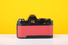 Load image into Gallery viewer, Konica Autoreflex TC 35mm SLR Film Camera with Konica Hexanon AR 28mm f3.5 Prime Lens in Red
