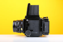 Load image into Gallery viewer, Mamiya RB67 Medium Format Film Camera with Mamiya-Sekor C 50mm f4.5 Lens and Mamiya Lens Hood plus Camera Strap