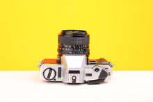 Load image into Gallery viewer, Minolta X-300 35mm Film Camera with Minolta MD 28mm f2.8 Lens in Red