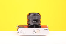 Load image into Gallery viewer, Minolta X-300 35mm Film Camera with Minolta MD 28mm f2.8 Lens in Red