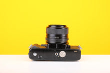 Load image into Gallery viewer, Minolta X-700 35mm Film Camera with Minolta MD 28mm f/2.8 Lens