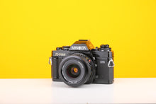 Load image into Gallery viewer, Minolta X-700 35mm Film Camera with Minolta MD 28mm f/2.8 Lens