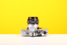 Load image into Gallery viewer, Olympus OM-2 35mm SLR Film Camera with Zuiko Olymplus OM-System G.Zuiko Auto-S 50mm f1.4 Lens in Yellow
