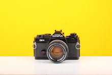 Load image into Gallery viewer, Olympus OM-4 35mm SLR Film Camera with Olympus Om-system G.Zuiko Auto-s 50mm f/1.4 Lens
