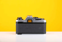 Load image into Gallery viewer, Olympus OM10 35mm Film Camera with Vivitar 28mm f2.8 MC Lens with Manual Adapter