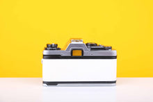 Load image into Gallery viewer, Olympus OM10 35mm Film Camera with Olympus OM-System Zukio Auto-S 50mm f1.8 Lens in New White Leather Skin