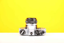 Load image into Gallery viewer, Olympus OM10 35mm Film Camera with Olympus Zukio Auto-S 50mm f1.8 Lens in Turquoise