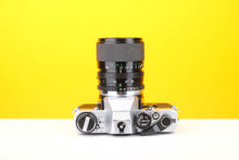 Load image into Gallery viewer, Olympus OM10 35mm SLR Film Camera with Miranda 28-70mm f3.8-4.8 MC Macro Lens