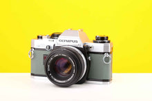Load image into Gallery viewer, Olympus OM10 35mm Film Camera with Olympus Zuiko Auto-S 50mm f1.8 Lens in Safari Green