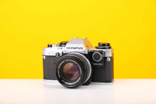 Load image into Gallery viewer, Olympus OM10 SLR 35mm Film Camera with Olympus Auto-S 50mm f1.8 MC Lens and Manual Adapter