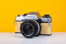 Load image into Gallery viewer, Olympus OM10 35mm SLR Film Camera with Olympus Zuiko OM-System Auto-S 50mm f1.8 Lens in Light Yellow