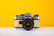 Load image into Gallery viewer, Olympus OM10 35mm SLR Film Camera with Olympus Zuiko OM-System Auto-S 50mm f1.8 Lens in Light Yellow