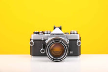 Load image into Gallery viewer, Olympus OM-1n 35mm SLR Film Camera with Olympus OM-System G.Zuiko Auto-S 50mm f1.4 Lens