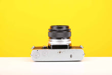 Load image into Gallery viewer, Olympus OM-1n 35mm SLR Film Camera with Olympus OM-System G.Zuiko Auto-S 50mm f1.4 Lens