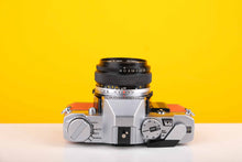 Load image into Gallery viewer, Olympus OM30 35mm Film Camera with Olympus Zuiko Auto-S 50mm f1.8 Lens in Orange