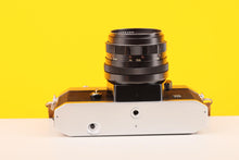 Load image into Gallery viewer, Yashica TL Electro 35mm SLR Film Camera with a Pentacon 50mm f/1.8 Lens