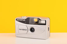 Load image into Gallery viewer, Vintage Olympus camera on a yellow background