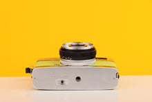 Load image into Gallery viewer, Olympus Trip 35 Vintage 35mm Film Camera with Zuiko 40mm f2.8 Lens with Customised Lime Leather Skin