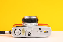 Load image into Gallery viewer, Olympus Trip 35 Vintage 35mm Film Camera in Red and Yellow Leather Skin