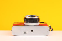 Load image into Gallery viewer, Olympus Trip 35 Vintage 35mm Film Camera in Red and Yellow Leather Skin