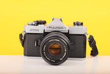 Load image into Gallery viewer, Fujica STX-1 35mm SLR Film Camera with 50mm X-Fujinon f1.9 Lens
