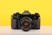 Load image into Gallery viewer, Canon A-1 35mm SLR Film Camera with Canon FD 50mm f1.8 Lens