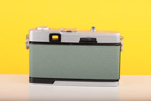 Load image into Gallery viewer, Olympus Trip 35 Vintage 35mm Film Camera with Zuiko 40mm f2.8 Lens and New Safari Green Leather Skin