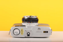 Load image into Gallery viewer, Olympus Trip 35 Vintage 35mm Film Camera with Zuiko 40mm f2.8 Lens and New Safari Green Leather Skin