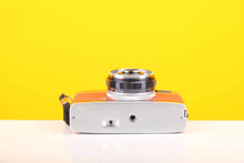 Load image into Gallery viewer, Olympus Trip 35 Vintage 35mm Film Camera with Zuiko 40mm f2.8 Lens and New Orange Leather Skin