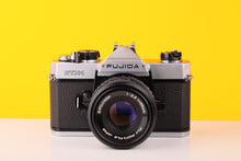 Load image into Gallery viewer, Fujica STX-1 35mm SLR Film Camera with X-Fujinon 55mm F 2.2 Lens